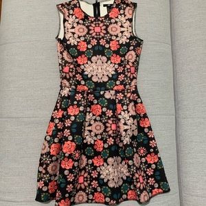 Jewelry-patterned dress.